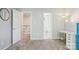 This bedroom features closet and bathroom access at 3810 Selwyn Farms Ln # 3, Charlotte, NC 28209