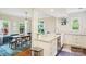 Bright kitchen open to dining area, showcasing granite countertops and modern appliances at 3810 Selwyn Farms Ln # 3, Charlotte, NC 28209