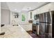 Modern kitchen featuring stainless steel appliances, granite countertops, and ample cabinet space at 3810 Selwyn Farms Ln # 3, Charlotte, NC 28209