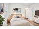 Comfortable bedroom featuring a queen-size bed, two bedside tables, and ample natural light at 3810 Selwyn Farms Ln # 3, Charlotte, NC 28209