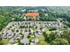 Established neighborhood with tree lined streets and manicured lawns at 392 Winecoff Woods Nw Dr, Concord, NC 28027