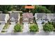 An aerial view of the property with property line dimensions overlaid, surrounded by mature trees and neighboring homes at 392 Winecoff Woods Nw Dr, Concord, NC 28027