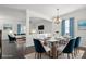 Stylish dining room featuring elegant furnishings and decor, perfect for hosting gatherings and creating memorable meals at 392 Winecoff Woods Nw Dr, Concord, NC 28027