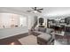 Comfortable living room with hardwood floors and an open layout to the kitchen at 392 Winecoff Woods Nw Dr, Concord, NC 28027