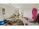Comfortable bedroom space with vaulted ceilings and natural light at 3985 Village Nw Blvd, Conover, NC 28613