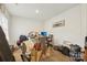 Untidy bedroom featuring wood flooring, desk and minimal decor at 3985 Village Nw Blvd, Conover, NC 28613