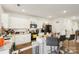 Bright kitchen featuring modern appliances, white cabinets, and granite countertops at 3985 Village Nw Blvd, Conover, NC 28613