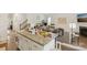 Kitchen with island and bar seating, next to comfortable living room at 3985 Village Nw Blvd, Conover, NC 28613