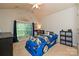 Unique ' room featuring a race car bed, arched window, and built-in storage at 4018 Harmattan Dr, Denver, NC 28037