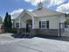 Community building with stone accents and ample parking, offers space for events and community gatherings at 4018 Harmattan Dr, Denver, NC 28037