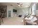 Relaxing living room with a comfortable sofa, decorative ladder, and view of the entertainment center at 4018 Harmattan Dr, Denver, NC 28037