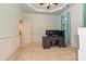 Cozy office featuring wainscoting, neutral carpet, and ample natural light at 4018 Harmattan Dr, Denver, NC 28037