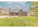 Home's backyard with well-manicured lawn and patio at 4113 Hoffmeister Dr, Waxhaw, NC 28173