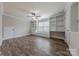 Bright bedroom has built in bookshelves and window seat and a ceiling fan at 4113 Hoffmeister Dr, Waxhaw, NC 28173