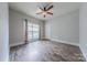 Neutral bedroom featuring a ceiling fan and window at 4113 Hoffmeister Dr, Waxhaw, NC 28173