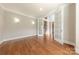 Home office offers hardwood floors, neutral paint, and glass doors for a bright and airy workspace at 4113 Hoffmeister Dr, Waxhaw, NC 28173