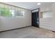 Bedroom with a large window, carpet and built in closet and dresser at 467 16Th Nw Ave, Hickory, NC 28601