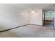 Bedroom boasts ample natural light with neutral carpet and white walls providing a serene and inviting atmosphere at 467 16Th Nw Ave, Hickory, NC 28601