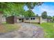 Charming single-story home with a brick accent wall and a covered carport at 467 16Th Nw Ave, Hickory, NC 28601