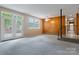Open living room with access to the backyard and adjacent rooms at 467 16Th Nw Ave, Hickory, NC 28601
