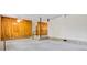 Spacious living room featuring retro wood paneling and neutral carpet at 467 16Th Nw Ave, Hickory, NC 28601