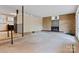 Spacious living room with a brick fireplace and neutral carpet at 467 16Th Nw Ave, Hickory, NC 28601