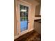 This back door leads to a rear patio and landscaped yard at 507 Putter Pl, Chester, SC 29706