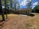 The backyard features a new patio and freshly seeded lawn at 507 Putter Pl, Chester, SC 29706