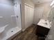Updated bathroom featuring a step-in shower and modern double sink vanity at 507 Putter Pl, Chester, SC 29706