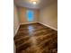 Bedroom with window and wood flooring at 507 Putter Pl, Chester, SC 29706