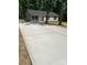 Home exterior with a wide concrete driveway and new landscaping at 507 Putter Pl, Chester, SC 29706