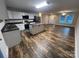 Kitchen featuring an island and stainless steel appliances, open to the living area at 507 Putter Pl, Chester, SC 29706