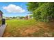 A spacious backyard and playground with play set offers room to relax and play in style at 5359 Lake Glenn Dr, Stanfield, NC 28163
