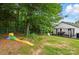 Amazing backyard with swing set, slide, and deck area for easy relaxing and entertaining at 5359 Lake Glenn Dr, Stanfield, NC 28163