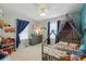 Cozy bedroom with playful decor, a unique bed frame, and bright natural light at 5359 Lake Glenn Dr, Stanfield, NC 28163