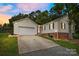 Charming single-Gathering home with attached garage, well-maintained lawn, and inviting curb appeal on a tranquil street at 5359 Lake Glenn Dr, Stanfield, NC 28163
