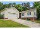 Well-maintained single-story home with attached garage and green shutters at 5359 Lake Glenn Dr, Stanfield, NC 28163