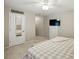Spacious main bedroom offers a view of the closet, television, and ensuite entrance at 5359 Lake Glenn Dr, Stanfield, NC 28163
