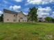 Spacious backyard perfect for outdoor activities with lush greenery and a serene atmosphere at 5607 Fulton Ridge Dr, Indian Trail, NC 28079