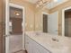 Bathroom featuring a double sink vanity and entry to a bedroom at 5607 Fulton Ridge Dr, Indian Trail, NC 28079