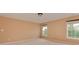 Carpeted bedroom with two large windows offering lots of natural light at 5607 Fulton Ridge Dr, Indian Trail, NC 28079