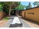 Backyard bocce ball court and screened porch enhance outdoor enjoyment at 6119 Bittersweet Ln, Charlotte, NC 28270