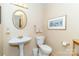 Charming half bathroom features classic fixtures, neutral tones, and a pedestal sink at 6119 Bittersweet Ln, Charlotte, NC 28270
