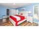 A bright bedroom featuring hardwood floors and large windows for plenty of natural light at 6119 Bittersweet Ln, Charlotte, NC 28270