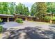 Charming home featuring an attached two-car garage, inviting entrance, and lush landscaping, perfect for curb appeal at 6119 Bittersweet Ln, Charlotte, NC 28270