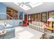 Sunlit living room with skylights, comfortable seating, and an open layout, perfect for relaxation and entertaining at 6119 Bittersweet Ln, Charlotte, NC 28270