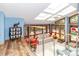 Bright and airy living room with skylights, stainless steel railings, and open floor plan, offering a welcoming space at 6119 Bittersweet Ln, Charlotte, NC 28270