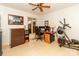 Office with a desk, file cabinet, exercise equipment, and natural light at 6119 Bittersweet Ln, Charlotte, NC 28270
