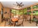 Screened-in porch featuring a dining set and views of the outdoors at 6119 Bittersweet Ln, Charlotte, NC 28270
