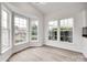 Bright breakfast nook with large windows and wood flooring at 622 Bayou Cir, Clover, SC 29710